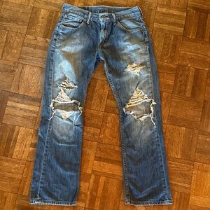 Levi’s 527 Distressed Blue Jeans